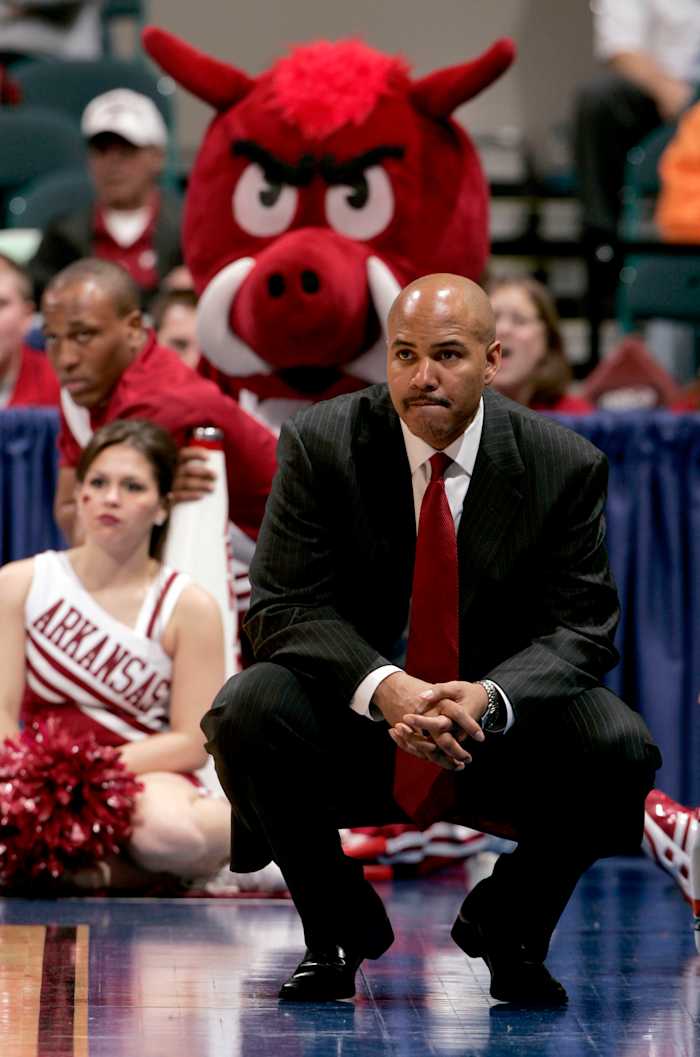 Arkansas Razorbacks head coach Stan Heath watches from the sidelines during the second half of a quarterfinal round SEC Tournament game against the Vanderbilt Commodores at the Georgia Dome in Atlanta.